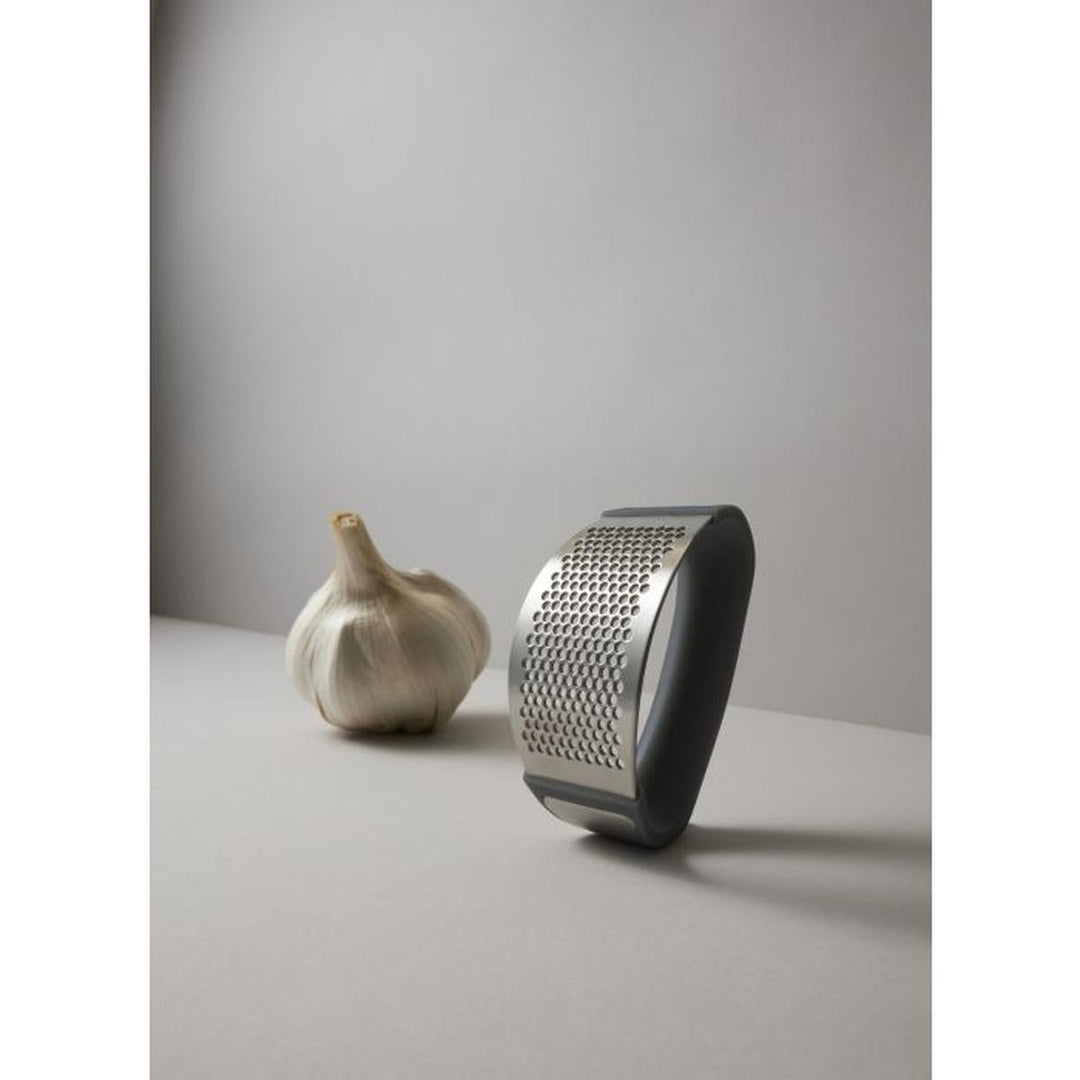 S V N A Garlic Crusher